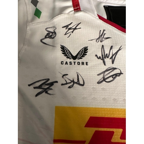 184A - A Harlequins rugby shirt signed by current players and staff with accompanying C.O.A. The proceeds o... 