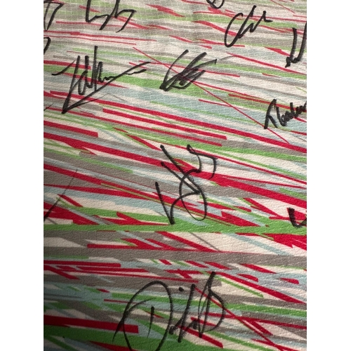 184A - A Harlequins rugby shirt signed by current players and staff with accompanying C.O.A. The proceeds o... 