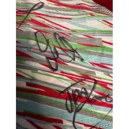 184A - A Harlequins rugby shirt signed by current players and staff with accompanying C.O.A. The proceeds o... 