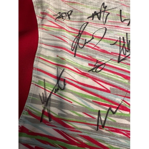 184A - A Harlequins rugby shirt signed by current players and staff with accompanying C.O.A. The proceeds o... 