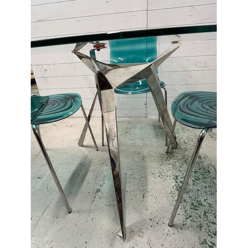 100 - L'eau chairs, metal frame and transparent wave technopoymer shell seat with a glass dining table on ... 