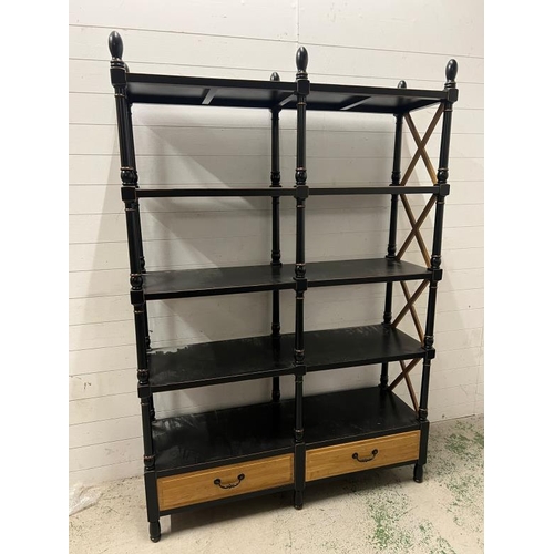 106 - Ebonised bookshelf with cross stretcher sides and drawers to base (H194cm W140cm D42cm)