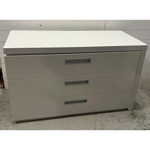 110 - A white gloss chest of drawers with swing out top (H76cm W125cm D55cm)