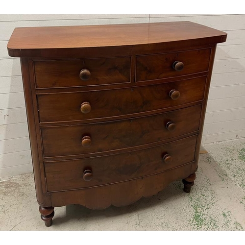 115 - A Georgian mahogany bow front chest of drawers (H122cm W122cm D55cm)