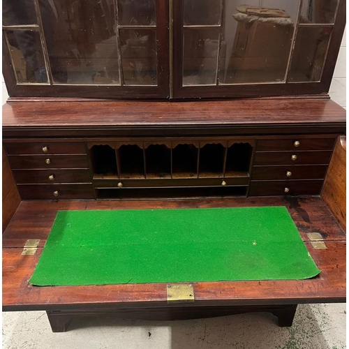 116 - A mahogany secretaire bookcase with glazed doors