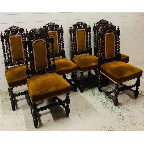 117 - A carved solid oak dining chairs