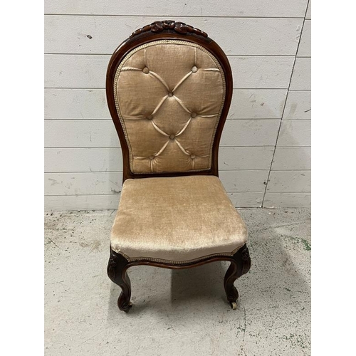 125 - A button back slipper chair