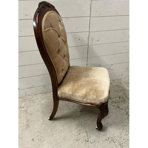 125 - A button back slipper chair