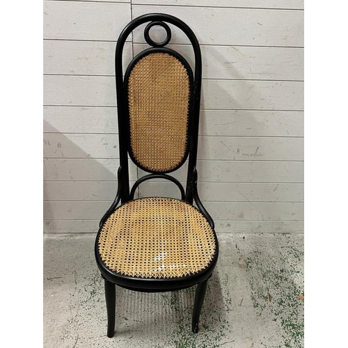 139 - A Bentwood ebonised cane seat and back chair stamped THONET