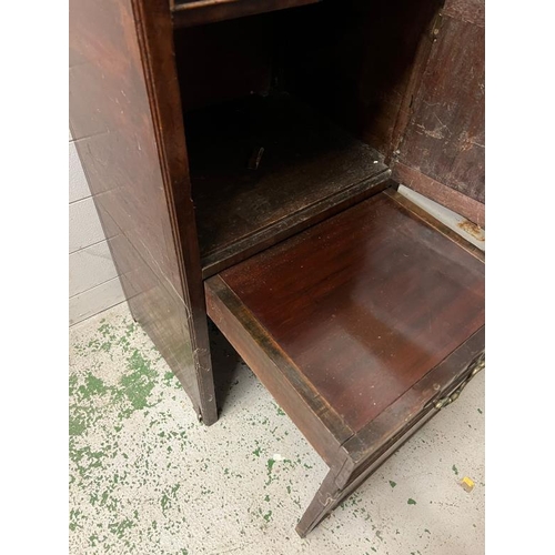 147 - A mahogany bedside cabinet, gallery top with hand cut outs opening to slide pull out stand and cupbo... 