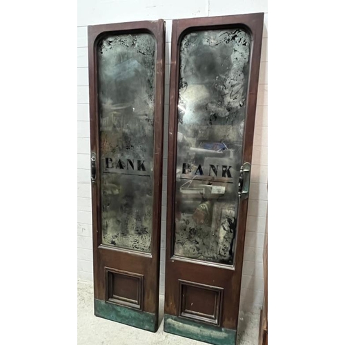 154 - A pair of reclaimed doors with adopted mirror panelled insert 213cm x 53cm