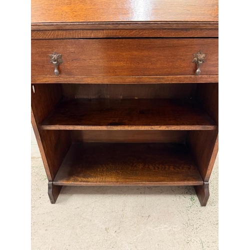 155 - An Arts and Crafts style bookcase bureau comprising of a two door stained glass cupboard over a bure... 