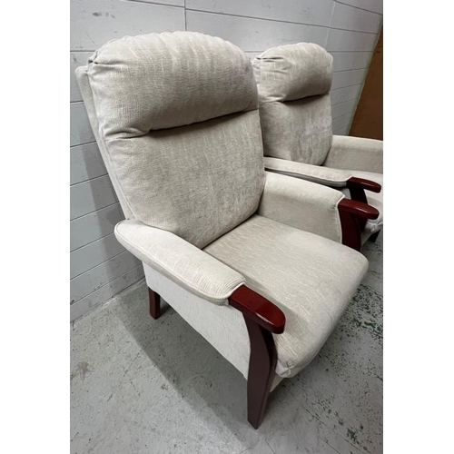 168 - A pair of cream Easy lounge chairs