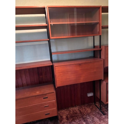 174 - A Mid Century ladderax style three piece wall unit with drawers, cupboard and a glazed unit. Height ... 