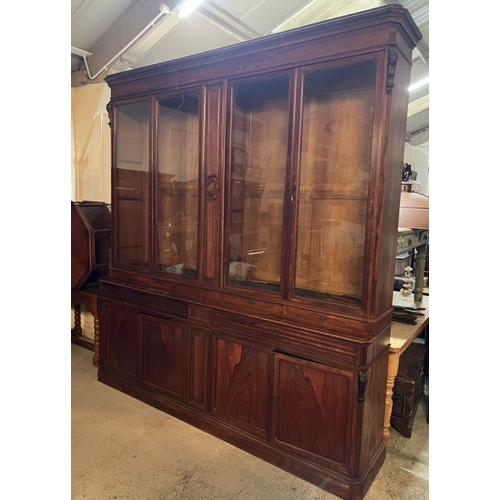 179 - Elegant English Georgian style bookcase, deep moulded cornice four glazed doors sitting over four lo... 