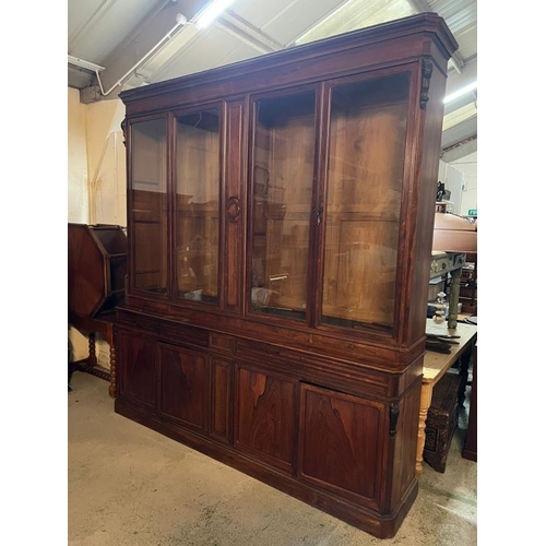 179 - Elegant English Georgian style bookcase, deep moulded cornice four glazed doors sitting over four lo... 