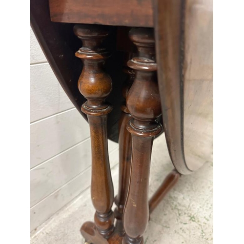 182 - An 19th Century Victorian Sutherland table with ceramic castors (H71cm W118cm D89cm)