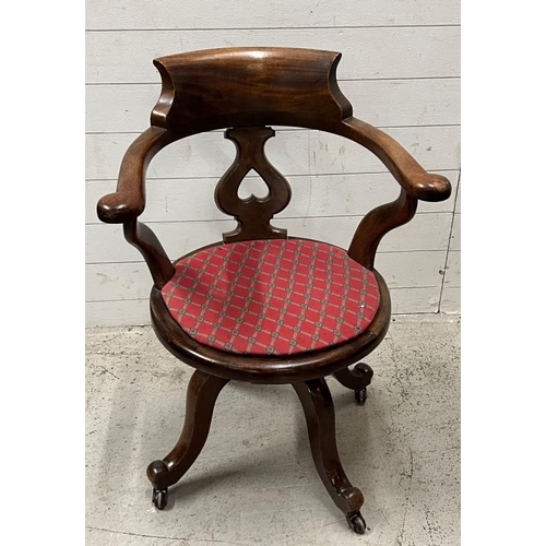 189 - A Victorian revolving chair with cane seat AF