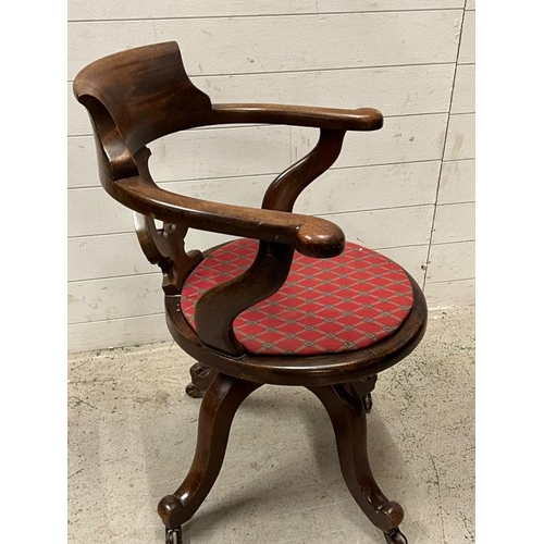 189 - A Victorian revolving chair with cane seat AF