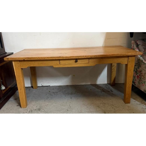 192 - A light oak kitchen or dining table with single short drawer to centre (H77cm W180cm D90cm)