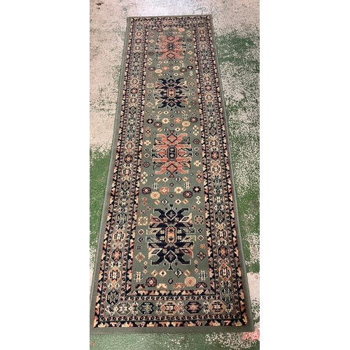 204 - A green and blue runner rug 220cm x 70cm