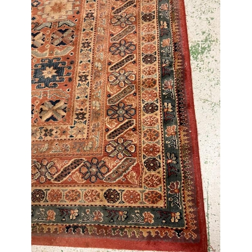 208 - A red and blue rug with multiply boarder 200cm x 140cm