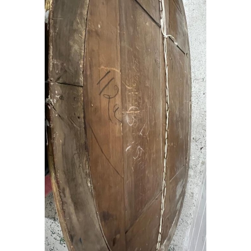 214 - A substantial oval gilt wall mirror, plaster frame AF (Frame 102cm x 128cm)