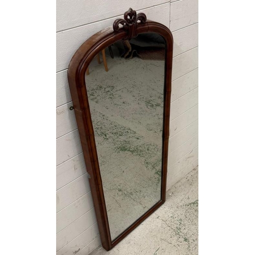 222 - A mahogany full length dressing mirror with scrolling top (H128cm W53cm)