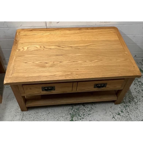 23 - A rustic oak coffee table (H46cm W93cm D55cm)