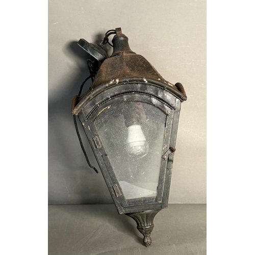 232 - A wall lantern with metal frame and glass panels