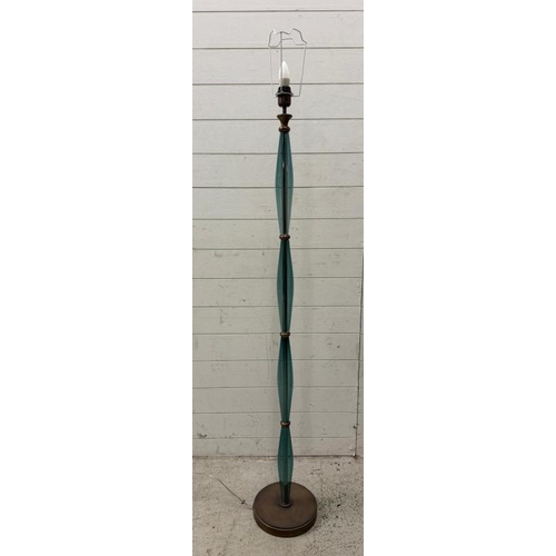 236 - A blue glass standard floor lamp with brass banding