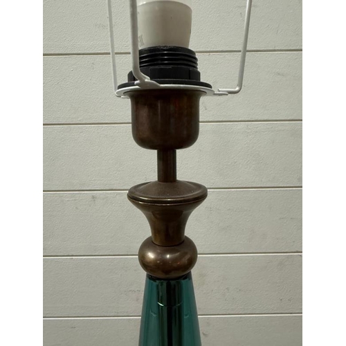 236 - A blue glass standard floor lamp with brass banding