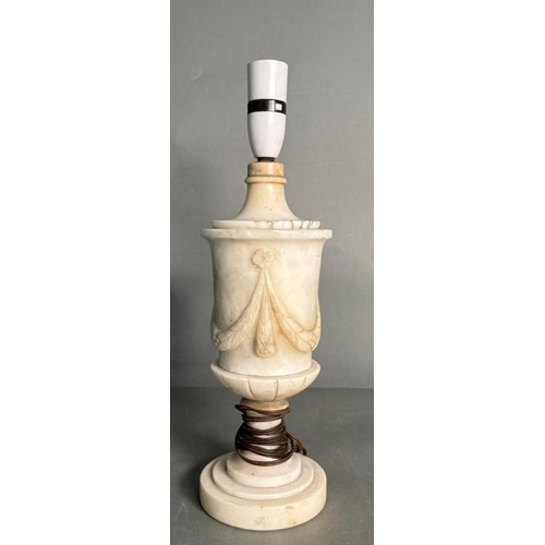 239 - A white marble table lamp with a central sash relief