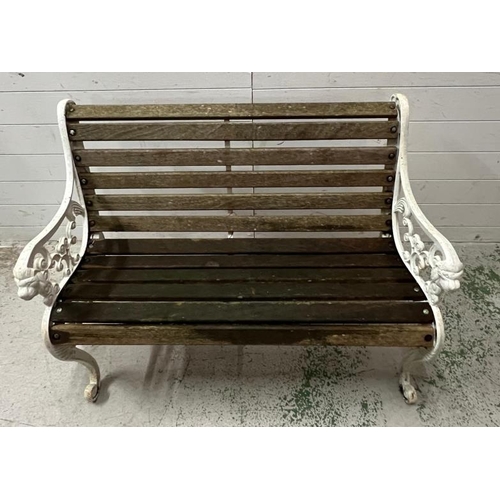 252 - A cast iron garden bench with slatted wooden seat (H77cm W104cm)