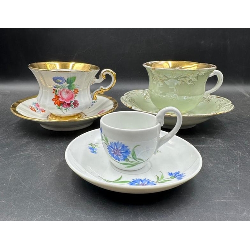 263 - Three Meissen tea cups various styles and designs.