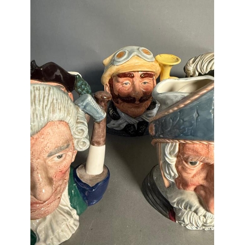 266 - Fourteen Royal Doulton character jug to include Jolly Toby, Auld Mac and Monty