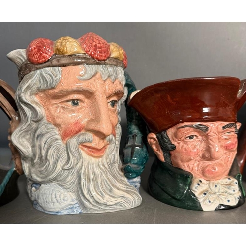 269 - Ten Royal Doulton character jugs to include Merlin, The Mad Halter and The Lawyer