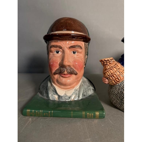 276 - A pair of Royal Doulton Sherlock Holmes and Doctor Watson bookends along with an 