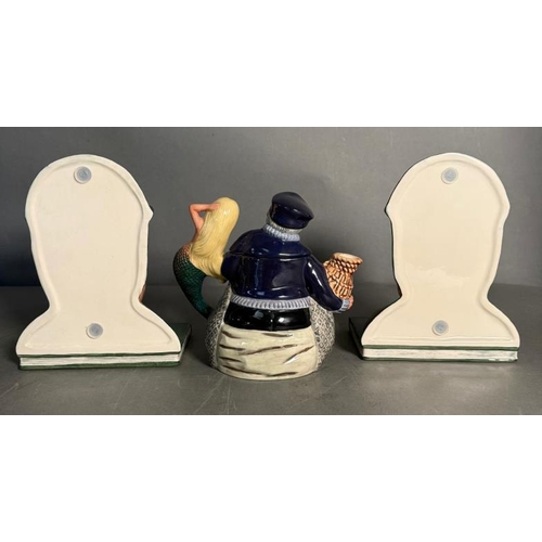 276 - A pair of Royal Doulton Sherlock Holmes and Doctor Watson bookends along with an 