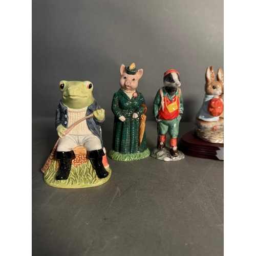 279 - A selection of Beswick figures to include Beatrix Potter 