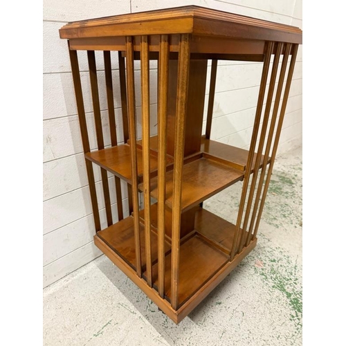 28 - An Edwardian inlaid mahogany revolving bookcase (H86cm W46cm D46cm)