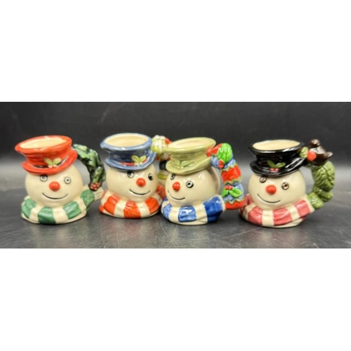 288 - Four Royal Doulton miniature Snowman character mugs