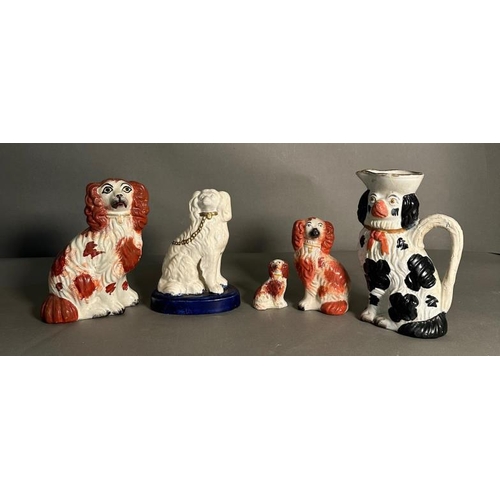 296 - A selection of Staffordshire spaniels in various colours