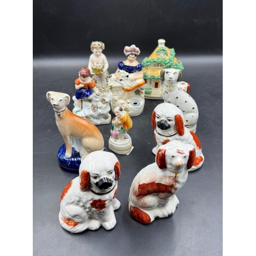 309 - A selection of Staffordshire figures various themes