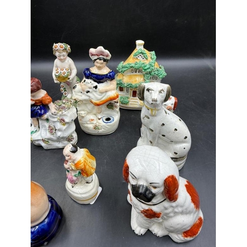 309 - A selection of Staffordshire figures various themes