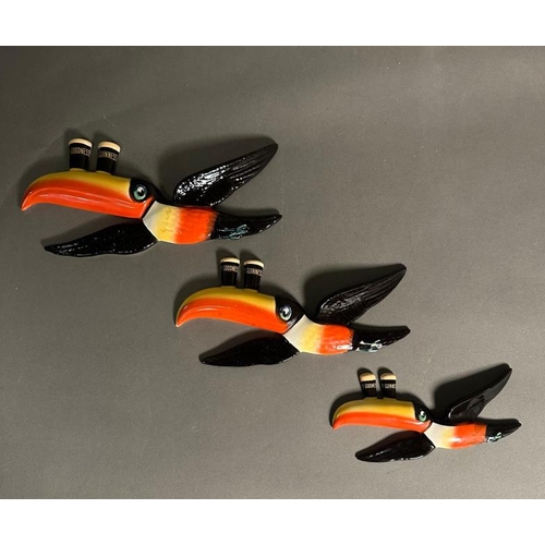 310 - A set of three graduated wall hanging Guinness toucans by Carlton ware