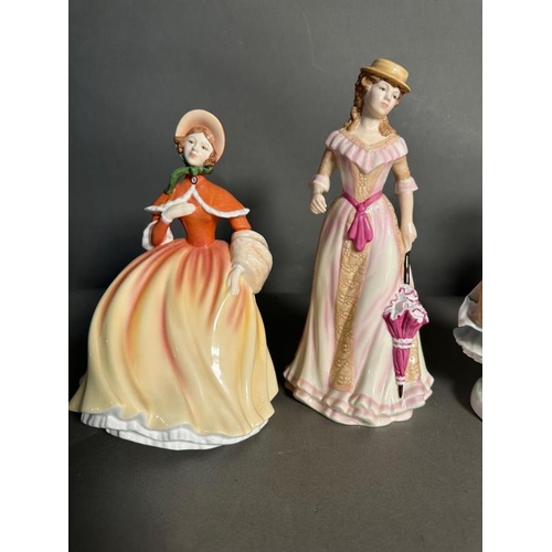 311 - Four Royal Doulton figures. Autumn, The Milkmaid, Christmas Day and Spring.