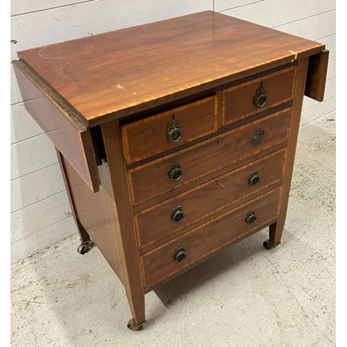 32 - An Edwardian mahogany chest of drawers with drop sides (Open H78cm W100cm D51cm)