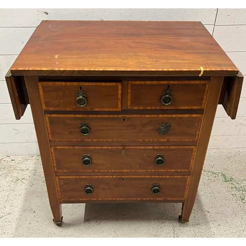 32 - An Edwardian mahogany chest of drawers with drop sides (Open H78cm W100cm D51cm)