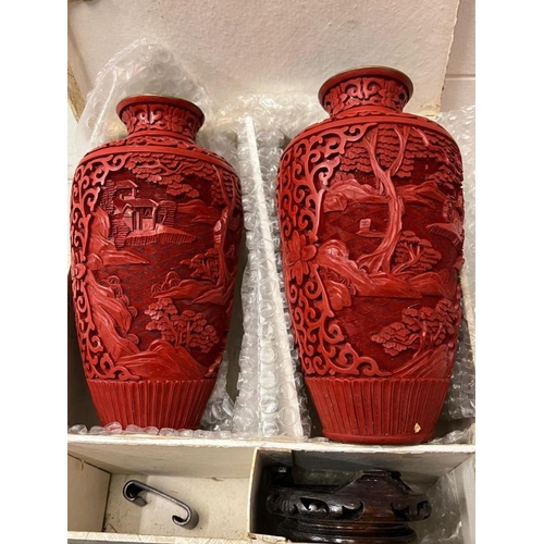 322 - A pair of Chinese cinnabar vases and a cloisonne pot